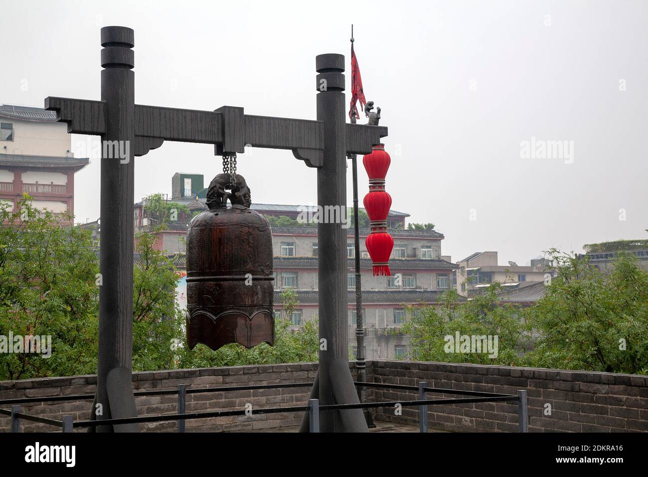 Ancient bell hanging at Anding West Gate Xian City Walls Stock Photo