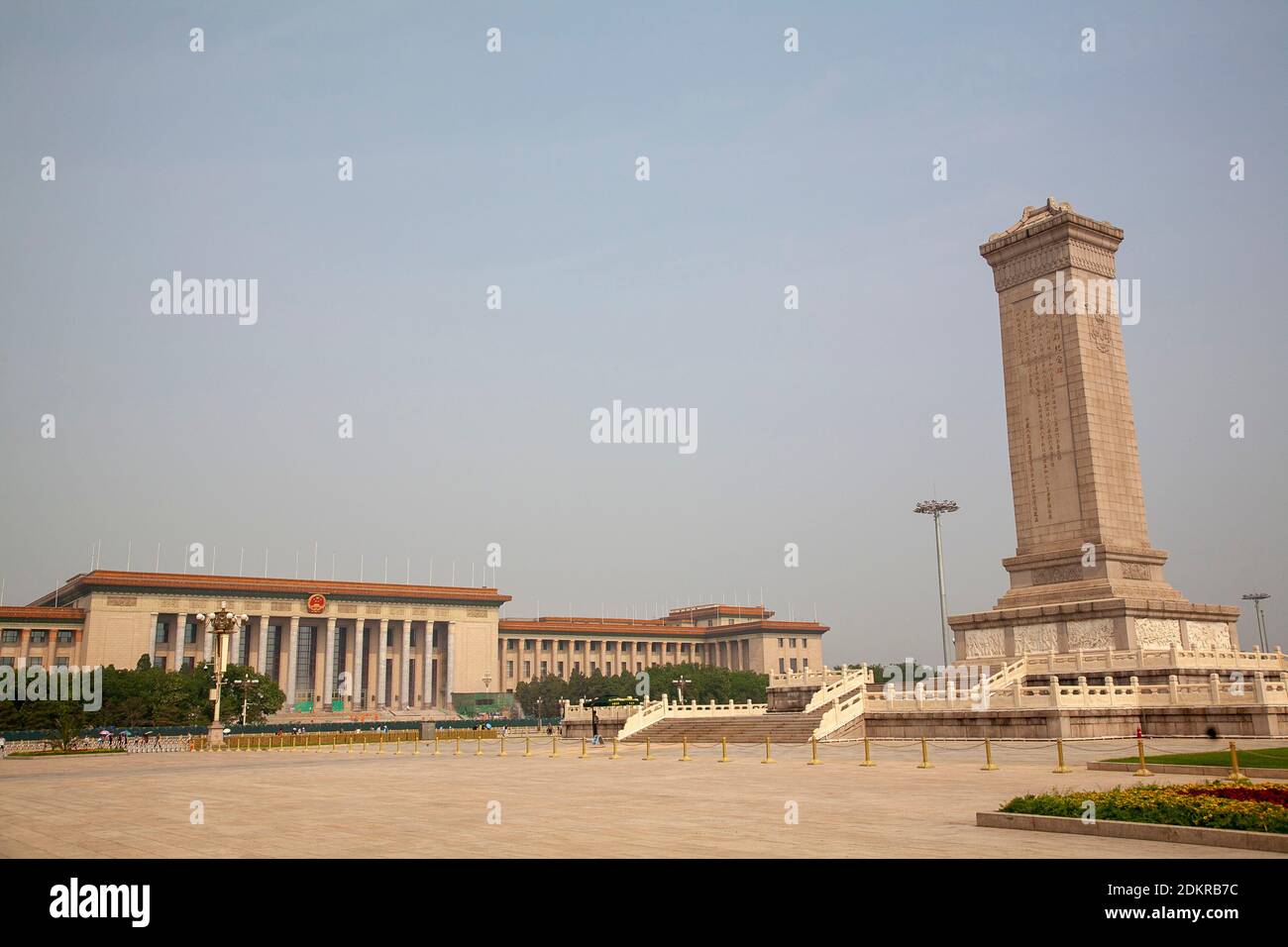 Monument to the People's Heroes with Great Hall of the People in background in Tiananmen Square or Tian'anmen Square Stock Photo