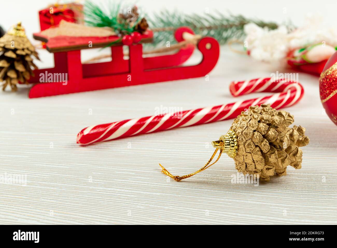 santa claus sleigh, lollipop staff, golden christmas tree cone and ...
