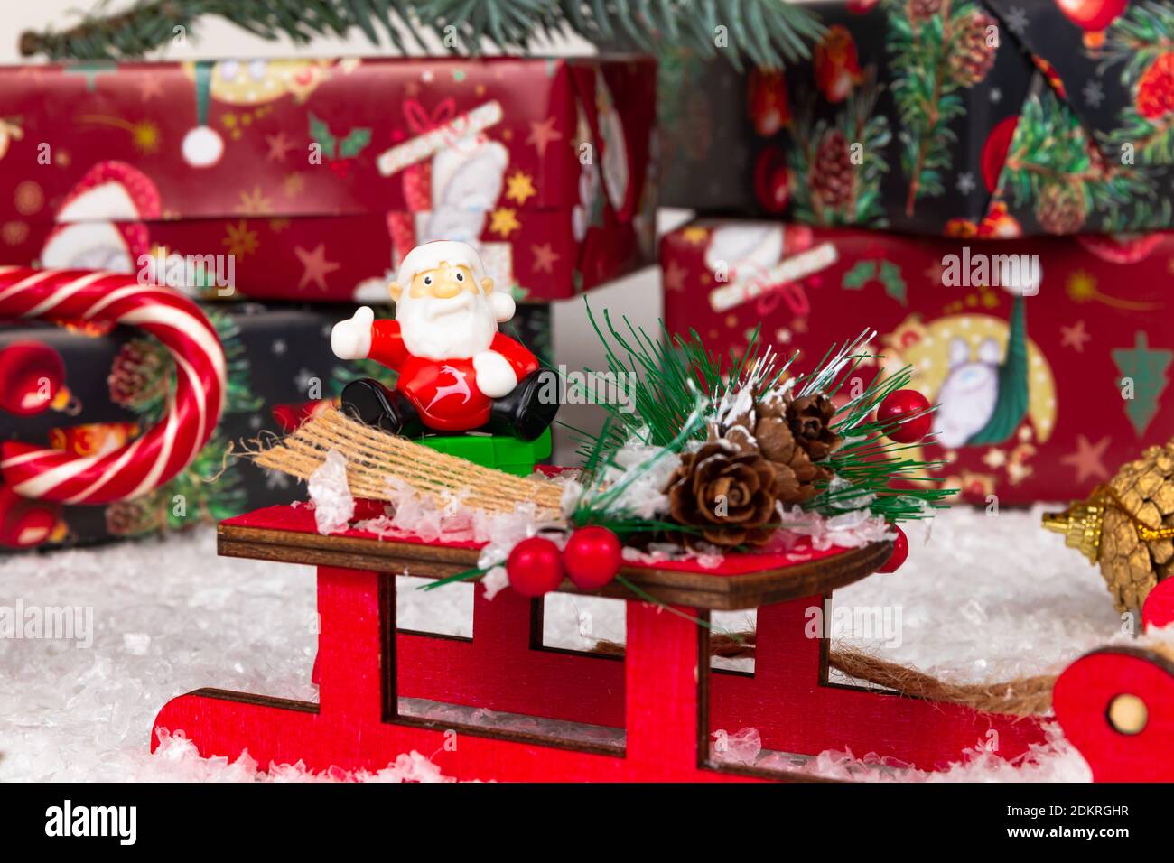santa claus on sleigh, lollipop staff, boxes with gifts, christmas tree ...