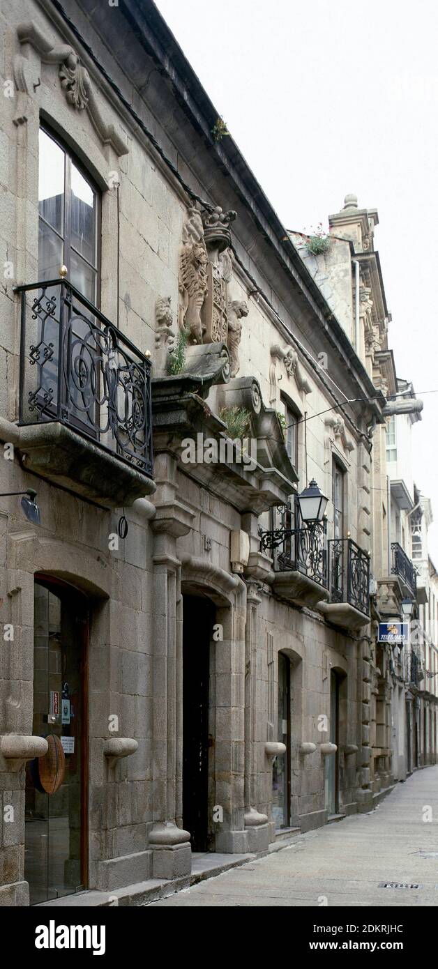 Spain, Galicia, Lugo province, Viveiro. Facade of the 'Casa dos Leóns' (House of Lions). Known by this name because of the two lions that hold the coat of arms on the main door. The facade is the only element that remains of an old pazo, in late Renaissance style from the 17th century. Stock Photo