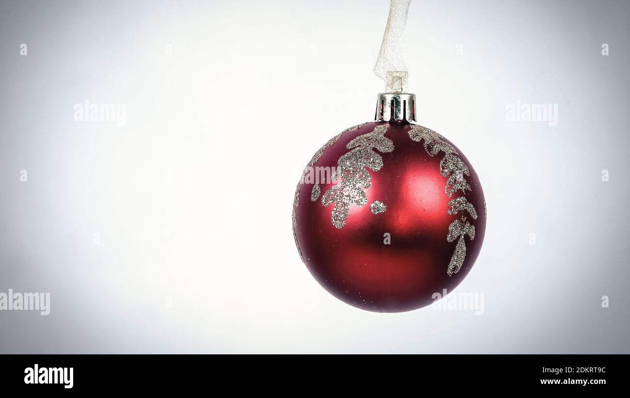 red Christmas ball isolated on a white background Stock Photo - Alamy