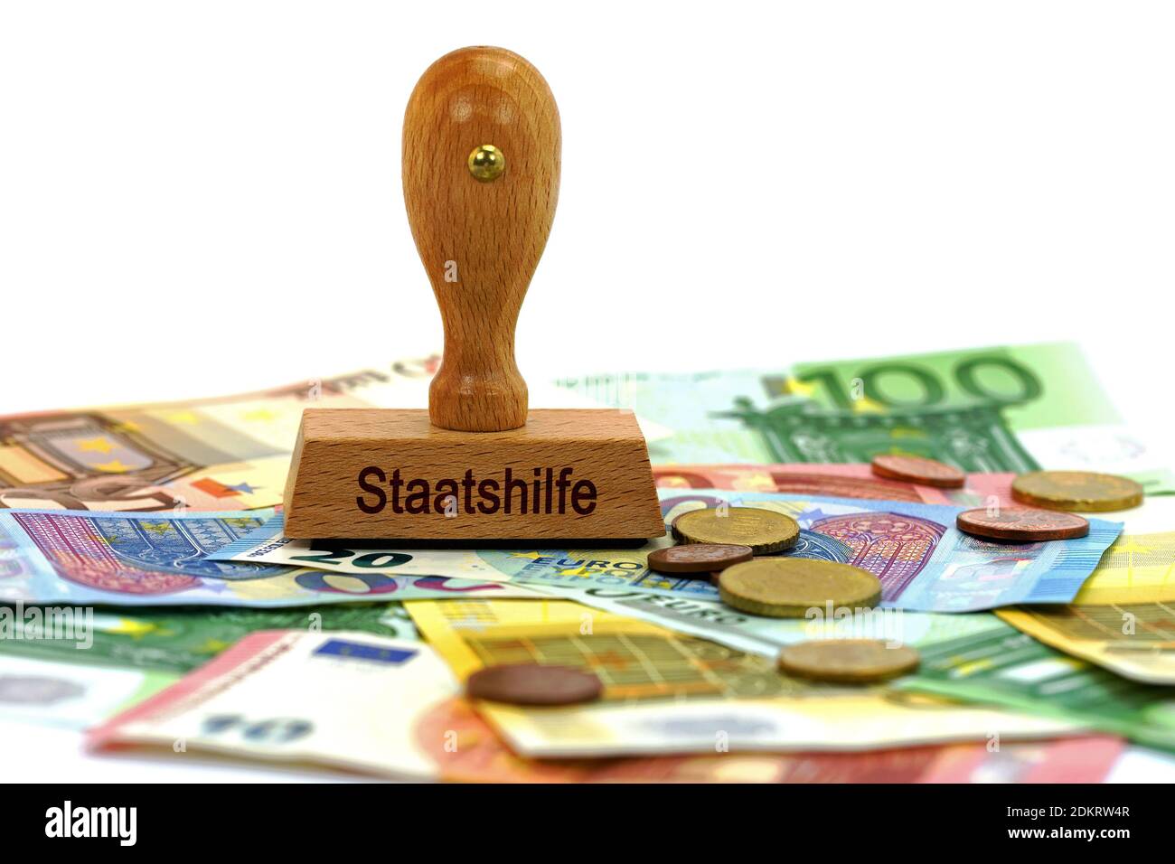 Stamp with the word 'Staatshilfe' on banknotes, translation 'State Aid' Stock Photo