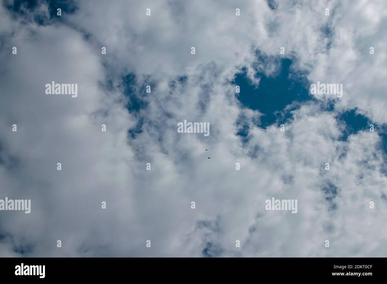 Abstract Cloudy sky background with blue sky between clouds Stock Photo