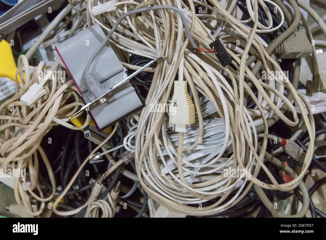 Old, obsolete computer and telephone parts and equipment about to be