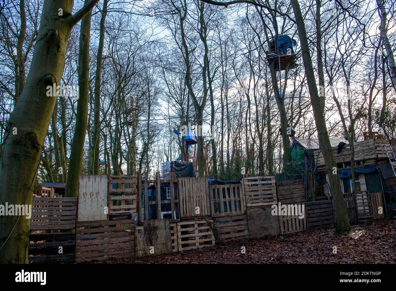 Wendover, Buckinghamshire, UK. 15th December, 2020. Tree houses high in the trees that HS2 intend destroying. Stop HS2 activists are busy at their Wendover Active Resistance Camp getting ready for the winter and building more tree houses. Their camp is situated in the direct route of the HS2 High Speed Rail link from London to Birmingham. The activists living at the camp are a collective of autonomous individuals with the aim of protecting the environment and wildlife. The controversial and over budget HS2 rail link puts 693 wildlife areas, 33 SSSIs and 108 ancient woodlands at risk. Credit: M Stock Photo