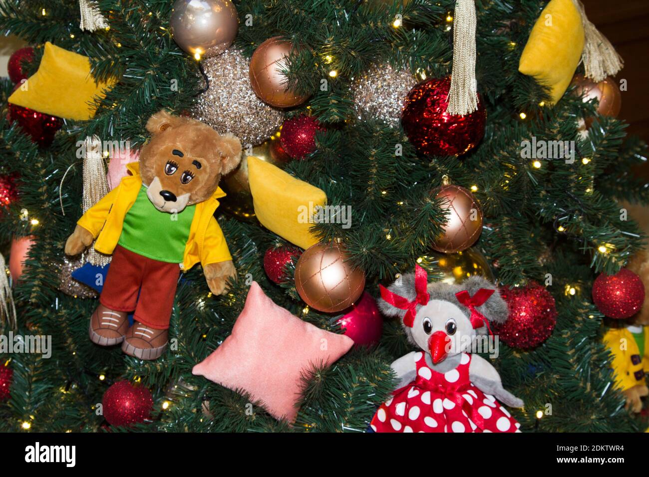 Christmas tree decor with children's soft toys Stock Photo Alamy