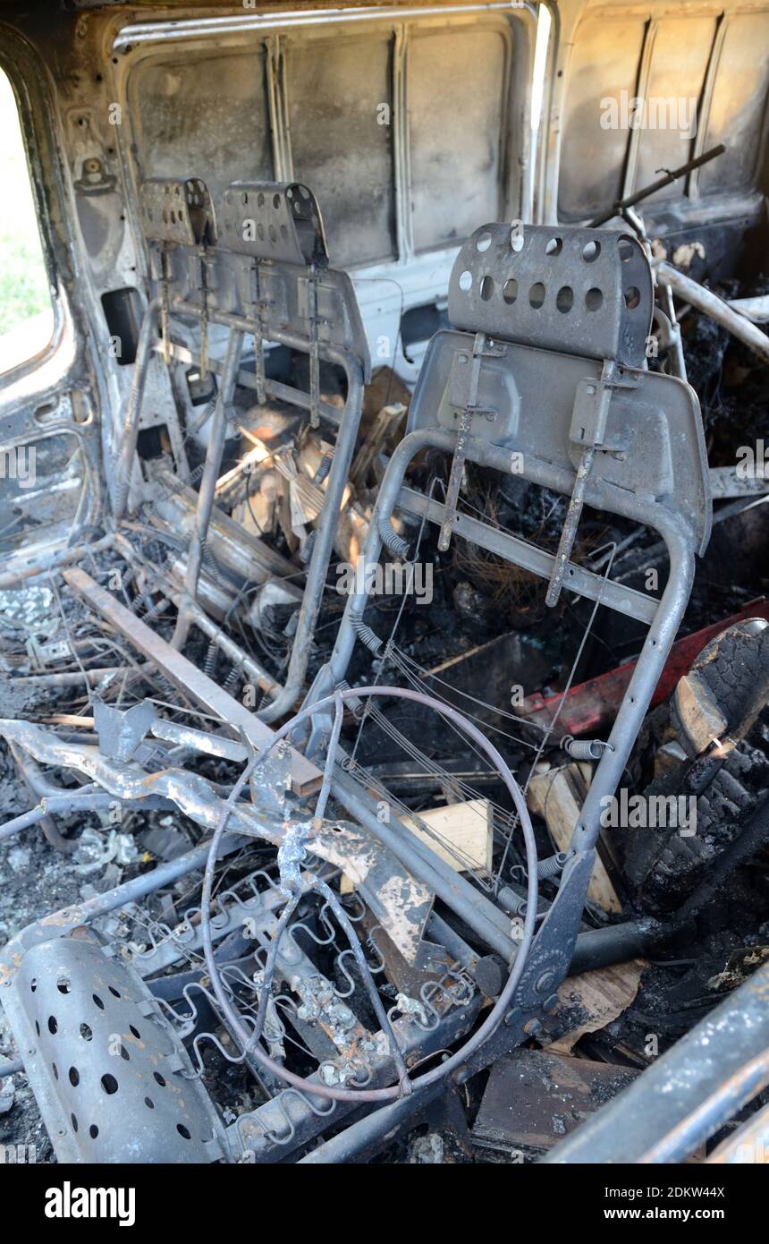 InteriorSeats of Burnt-Out Car or Wrecked Car Vandalised by Arsonists Stock Photo