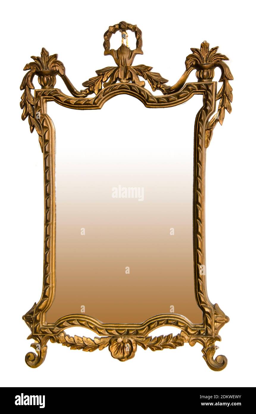 Antique mirror with carved wood frame on the white background