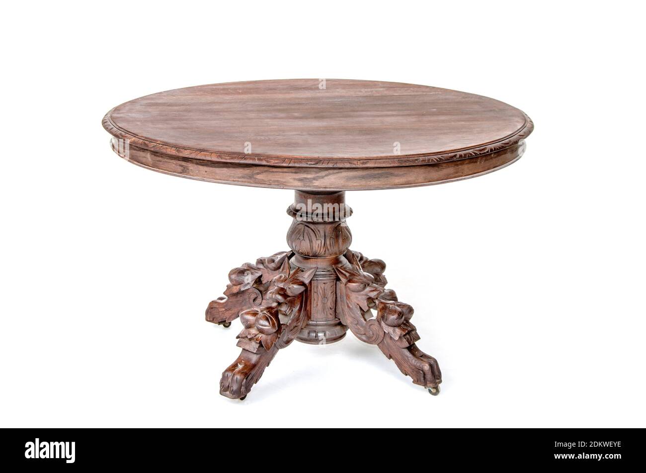 Antique round kitchen table on the white background Stock Photo