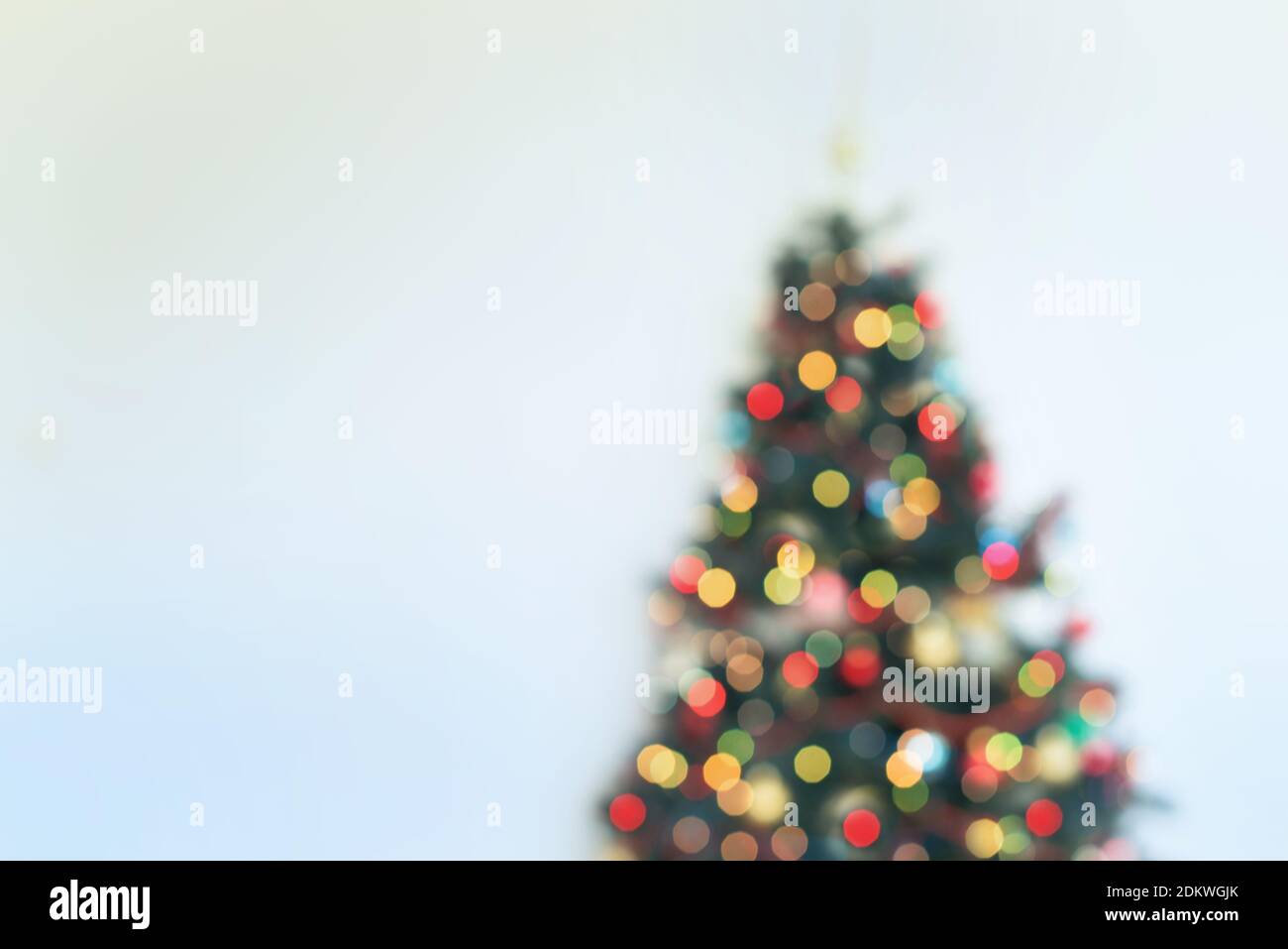 Defocused Christmas tree with lights Stock Photo
