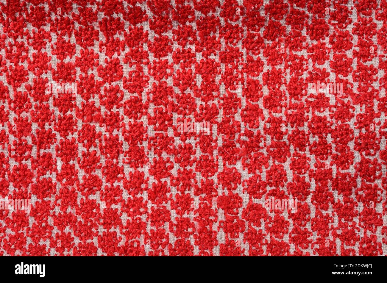Homemade embroidered with red threads on canvas Stock Photo Alamy