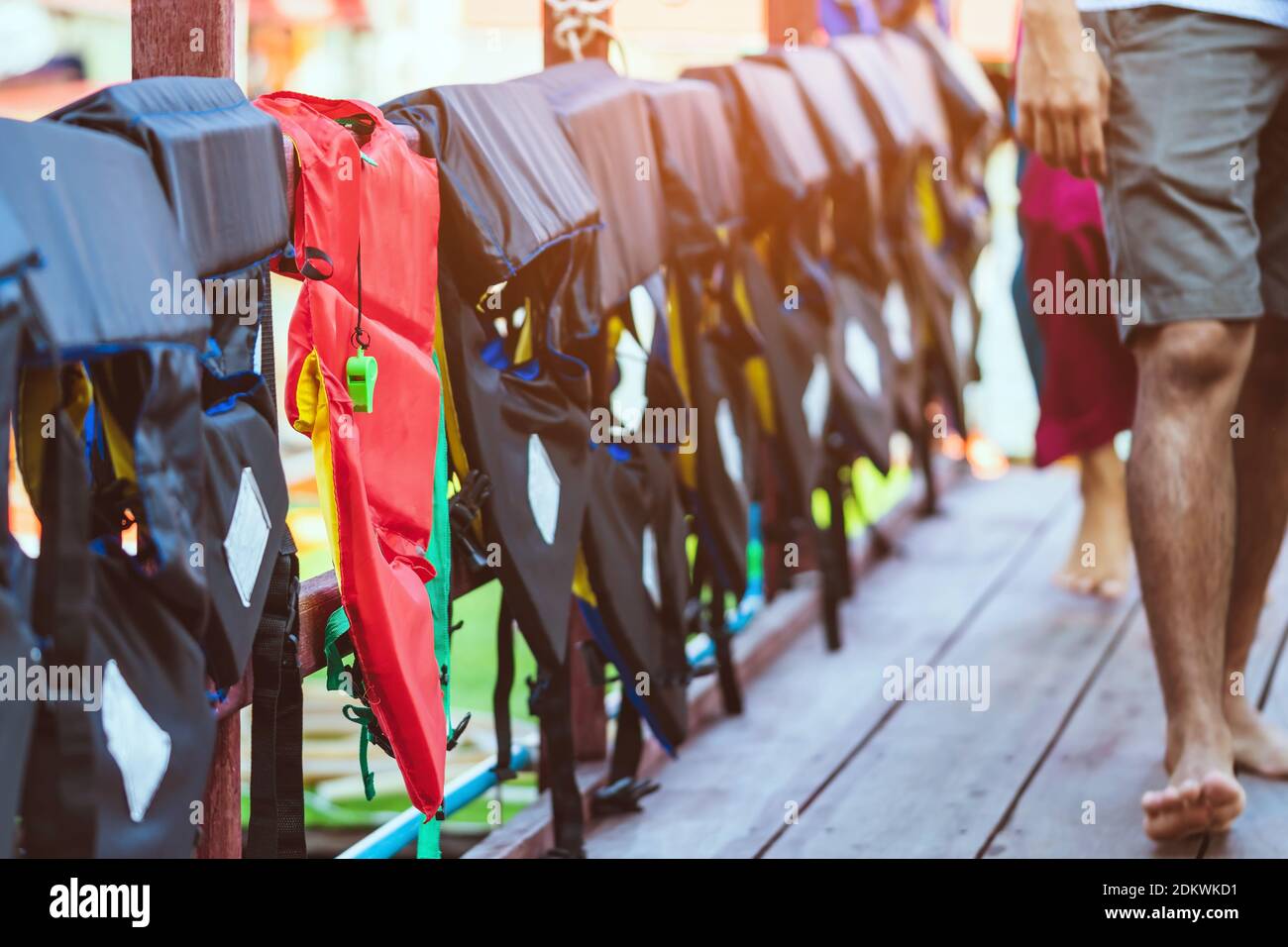 Group Of People Walking In Row Stock Photo