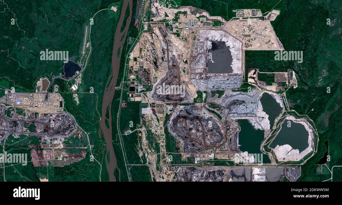 Canadian oil sand production facility from space Stock Photo
