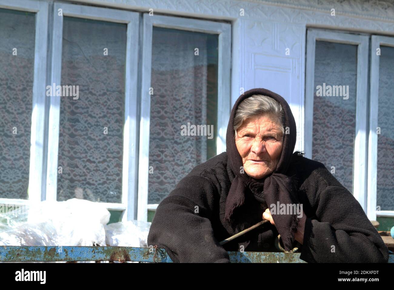 A widow in Romania's countryside Stock Photo