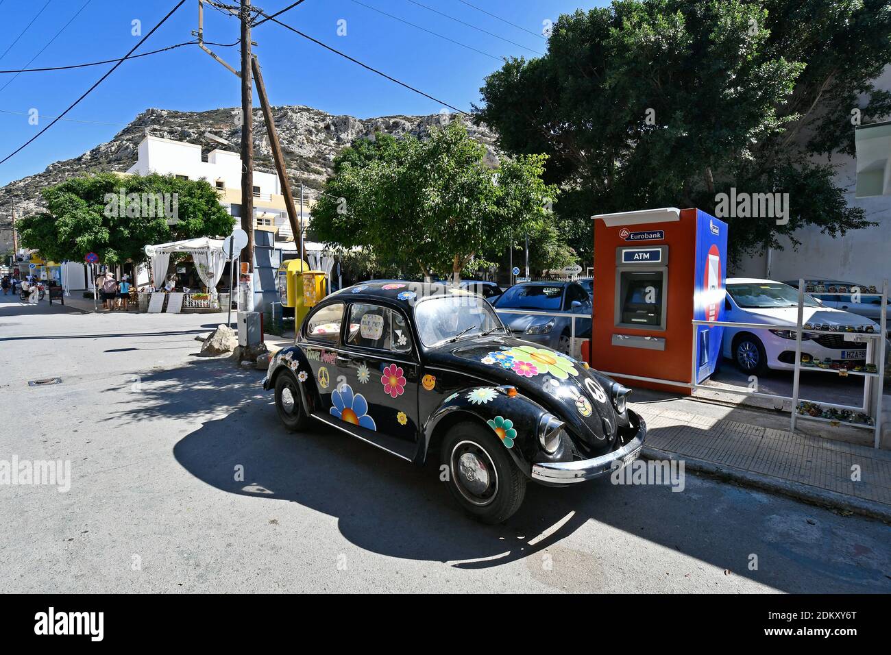 Matala, Greece - October 07, 2018: Beetle car as reminiscence to former flower power generation in the village in the south of Crete Stock Photo