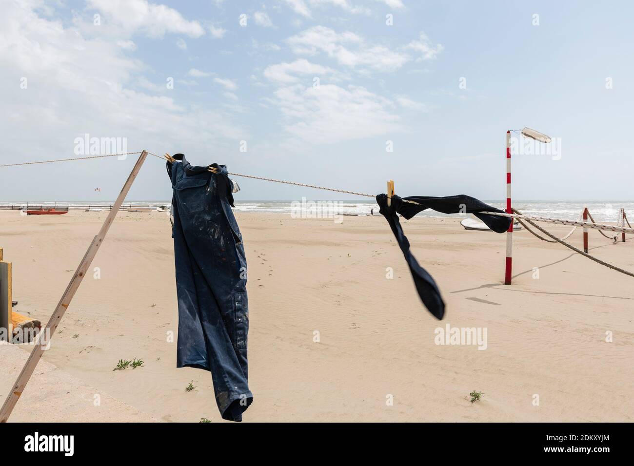 Clothes Drying On Clothesline At Beach Against Sky Stock Photo