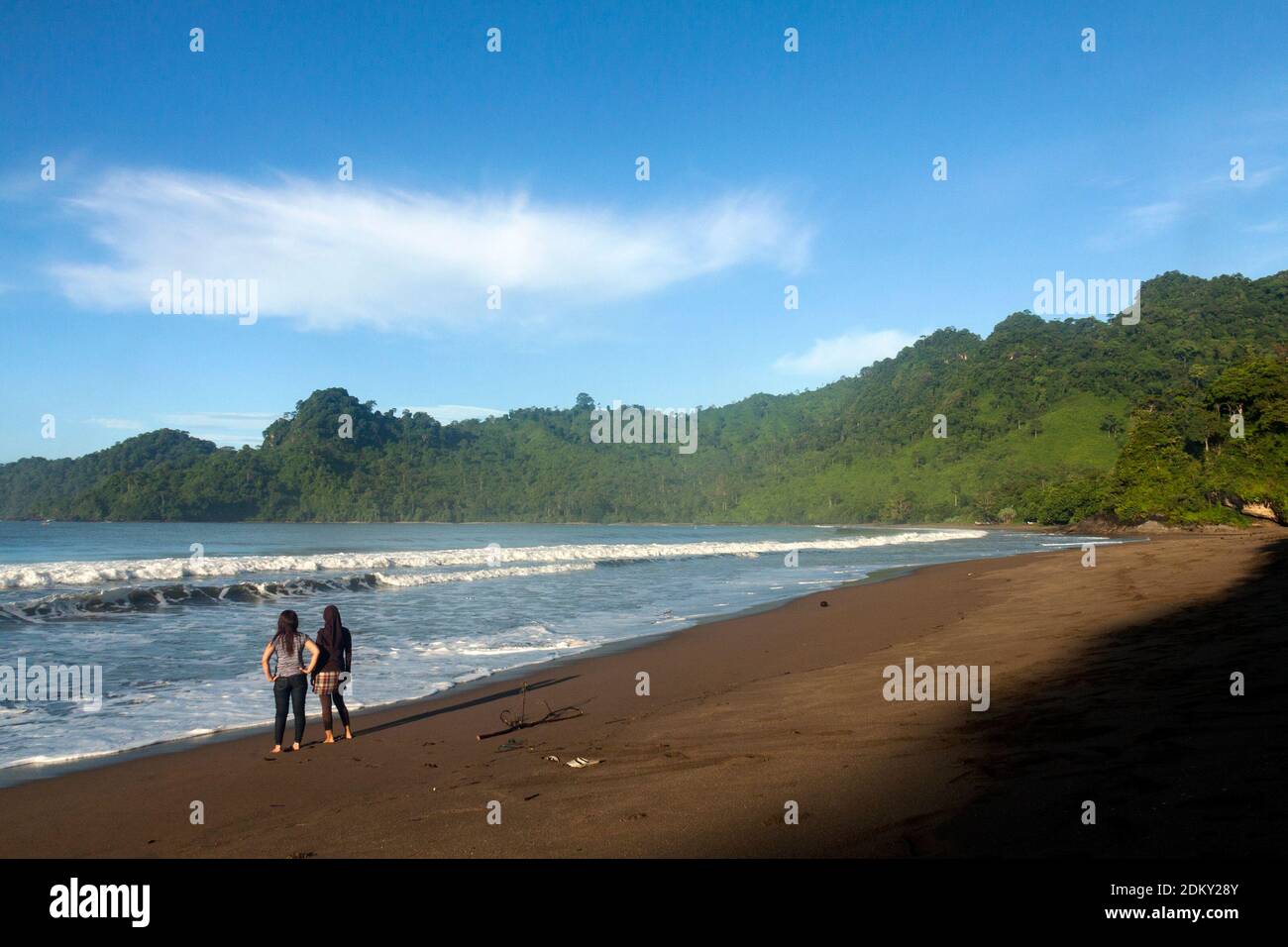 Tourists are enjoying the atmosphere of Bandealit beach in Meru Betiri National Park, Jember. Stock Photo