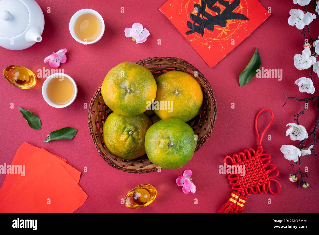 Top view of fresh ripe tangerine mandarin orange with fresh leaves on