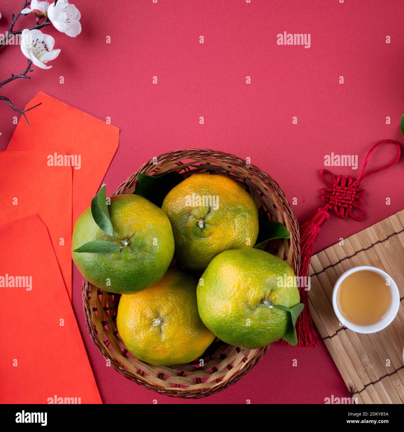 Top view of fresh ripe tangerine mandarin orange with fresh leaves on