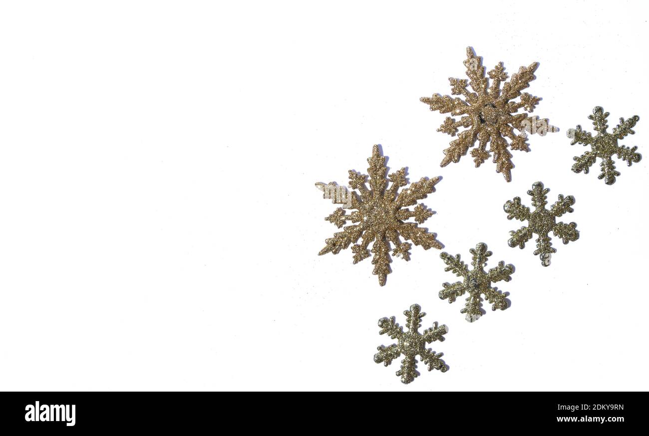 Gold glitter texture snowflakes isolated on white background. Abstract ...