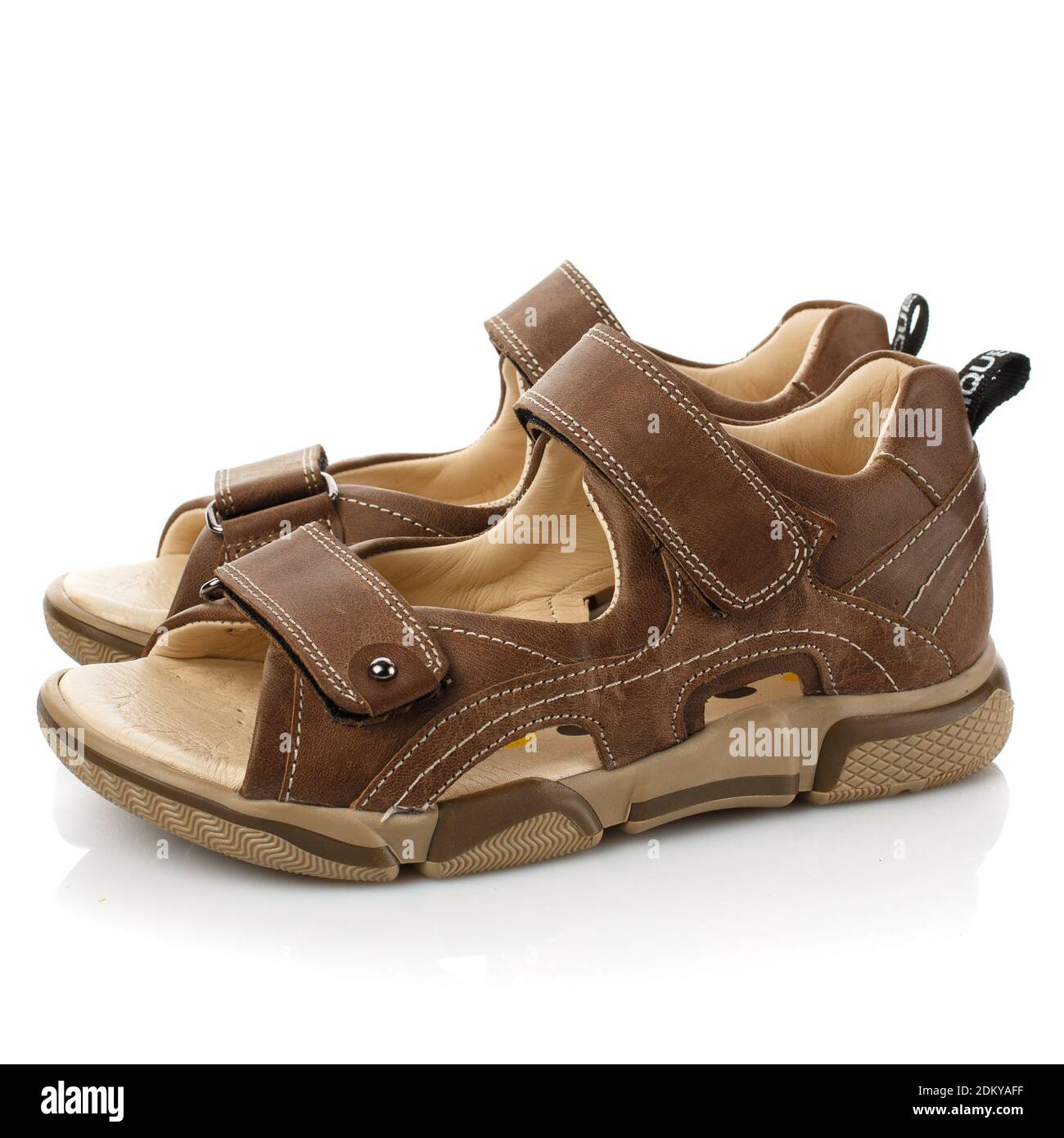 Brown sandals for boy on white background Stock Photo - Alamy