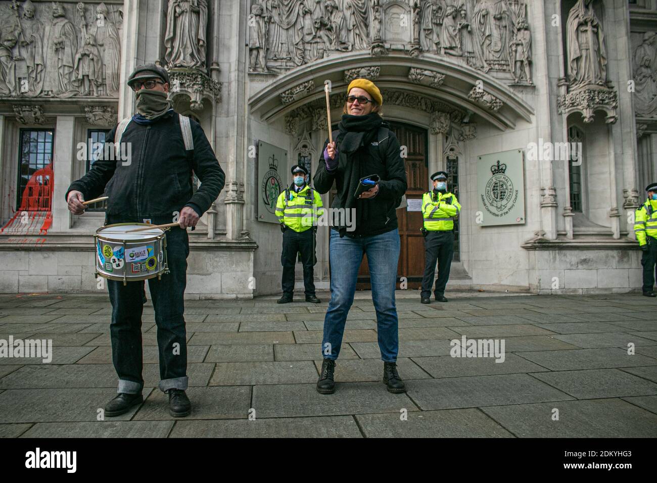 WESTMINSTER LONDON 16 December 2020. Environmental activists from Extinction rebellion protest as Supreme Court delivers the verdict on a legal challenge to the proposed runway expansion. Heathrow airport won a Supreme Court challenge over a ruling made earlier this year to block a third runway at Europe's busiest hub on environmental grounds as the highest court overturned a Court of Appeal ruling in February that the UK government had failed to take into account climate change commitments when it gave the green light for the third runway. Credit: amer ghazzal/Alamy Live News Stock Photo