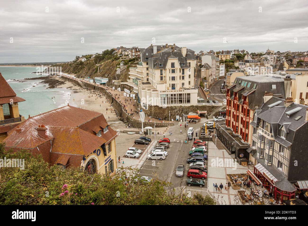 Coastal town foreshore scene with hotel, restaurant and car park. Stock Photo