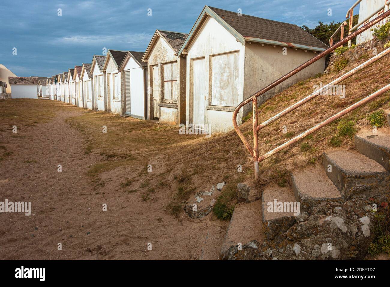 White beach huts in a row, in Normandy region,France Stock Photo