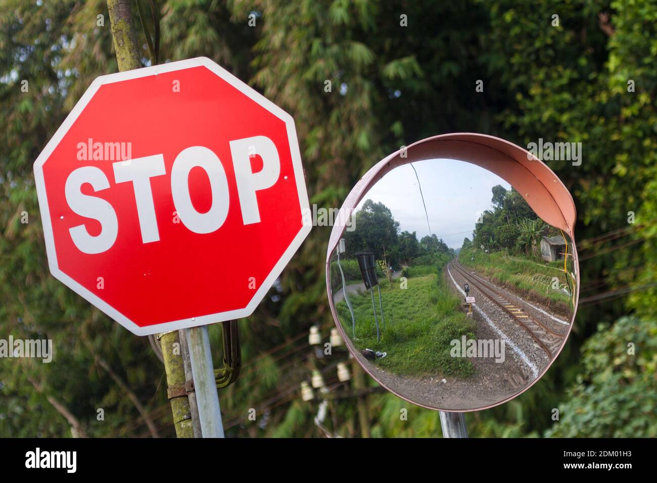 Signs for stopping before crossing the tracks Stock Photo