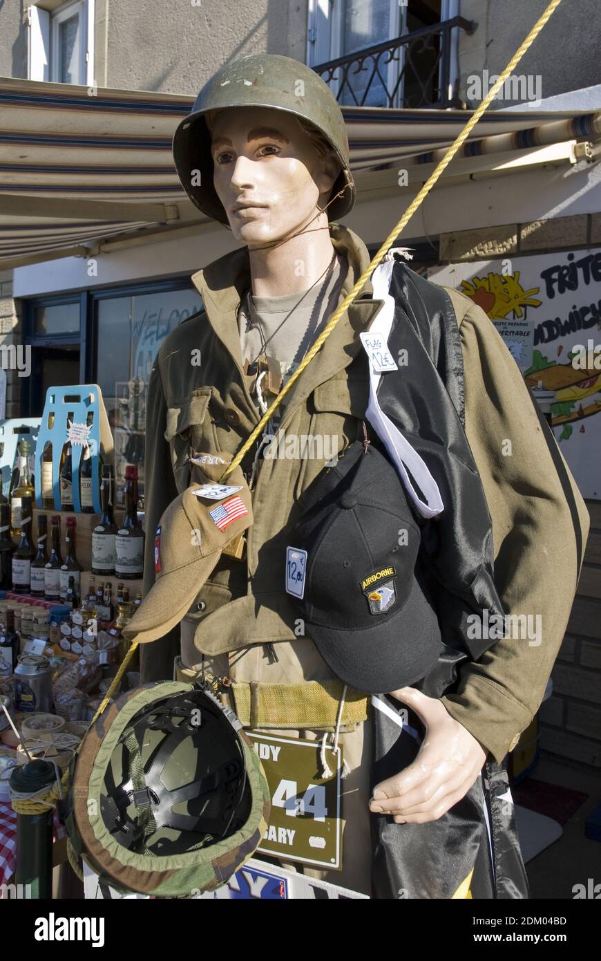 A mannequin dressed as a World War Two American soldier with souvenirs for sale, at Arromanches