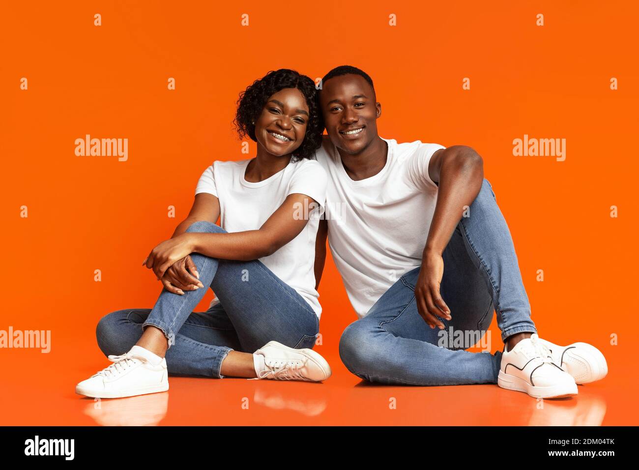 Man sitting floor studio shot hi-res stock photography and images - Alamy