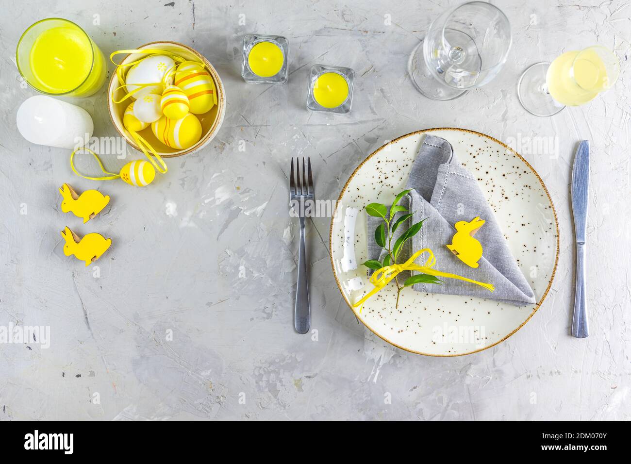Ultimate Gray and Illuminating colors aesthetic elegant fine Easter events table place setting overhead. Top view creative composition flat lay. Stock Photo