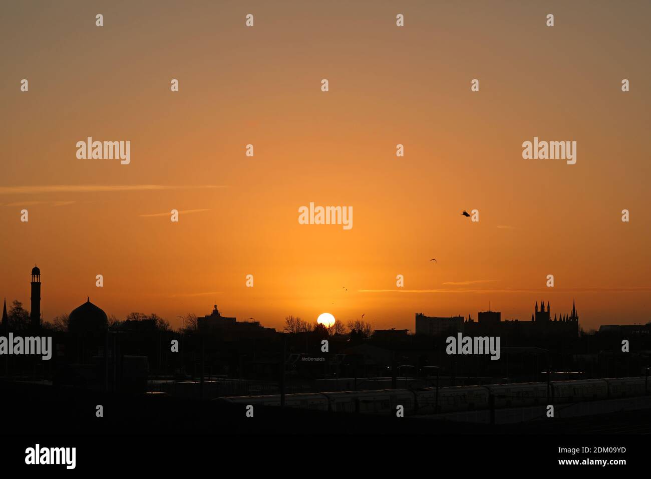 A beautiful morning at sunrise with Peterborough Cathedral (right) and the Faizan E Madina A beautiful morning at sunrise with Peterborough Cathedral (right) and the Faizan E Madina