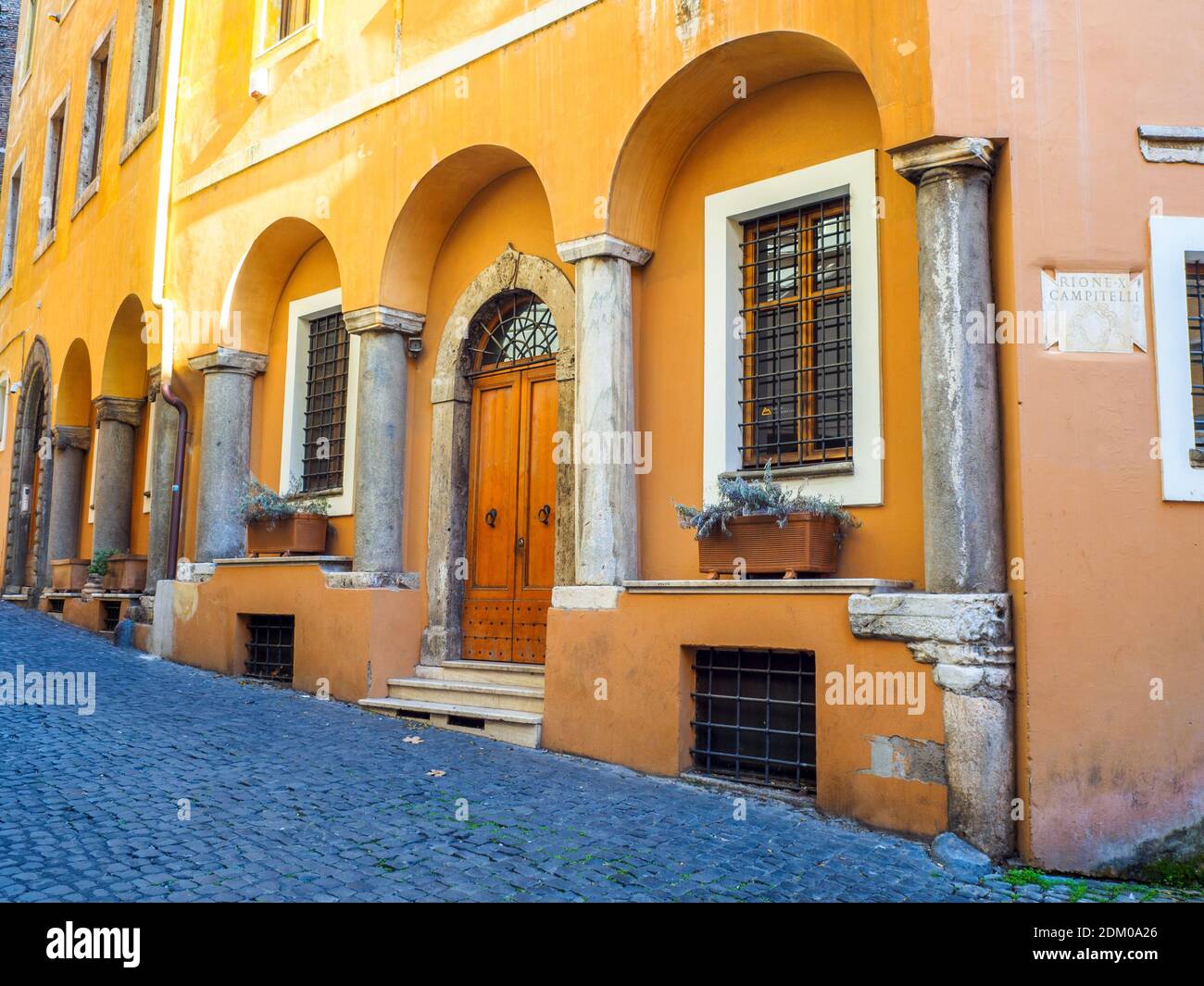 House facade with columns in rione Campitelli - Rome, Italy Stock Photo