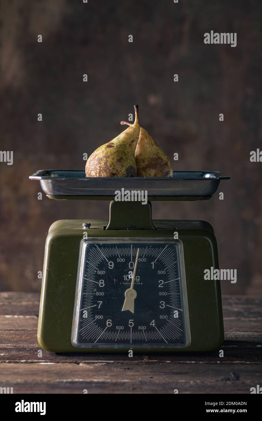 Vintage Scales on Wooden Table with Potatoes Stock Photo