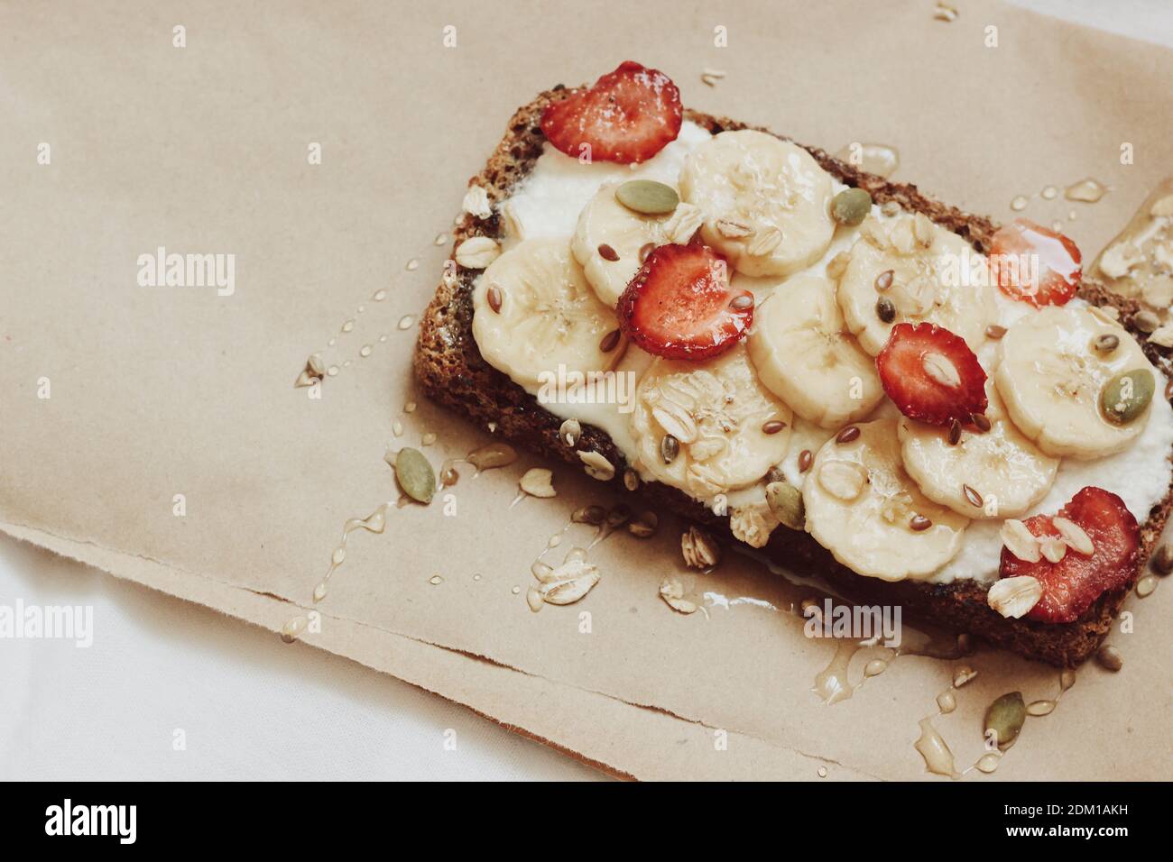 Nutritional wholegrain healthy breakfast toast with fruit, peanut