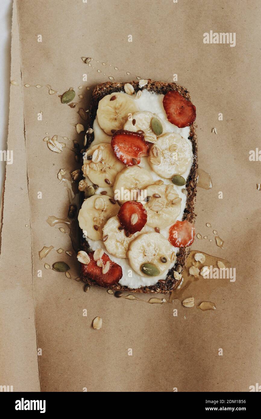 Nutritional wholegrain healthy breakfast toast with fruit, peanut