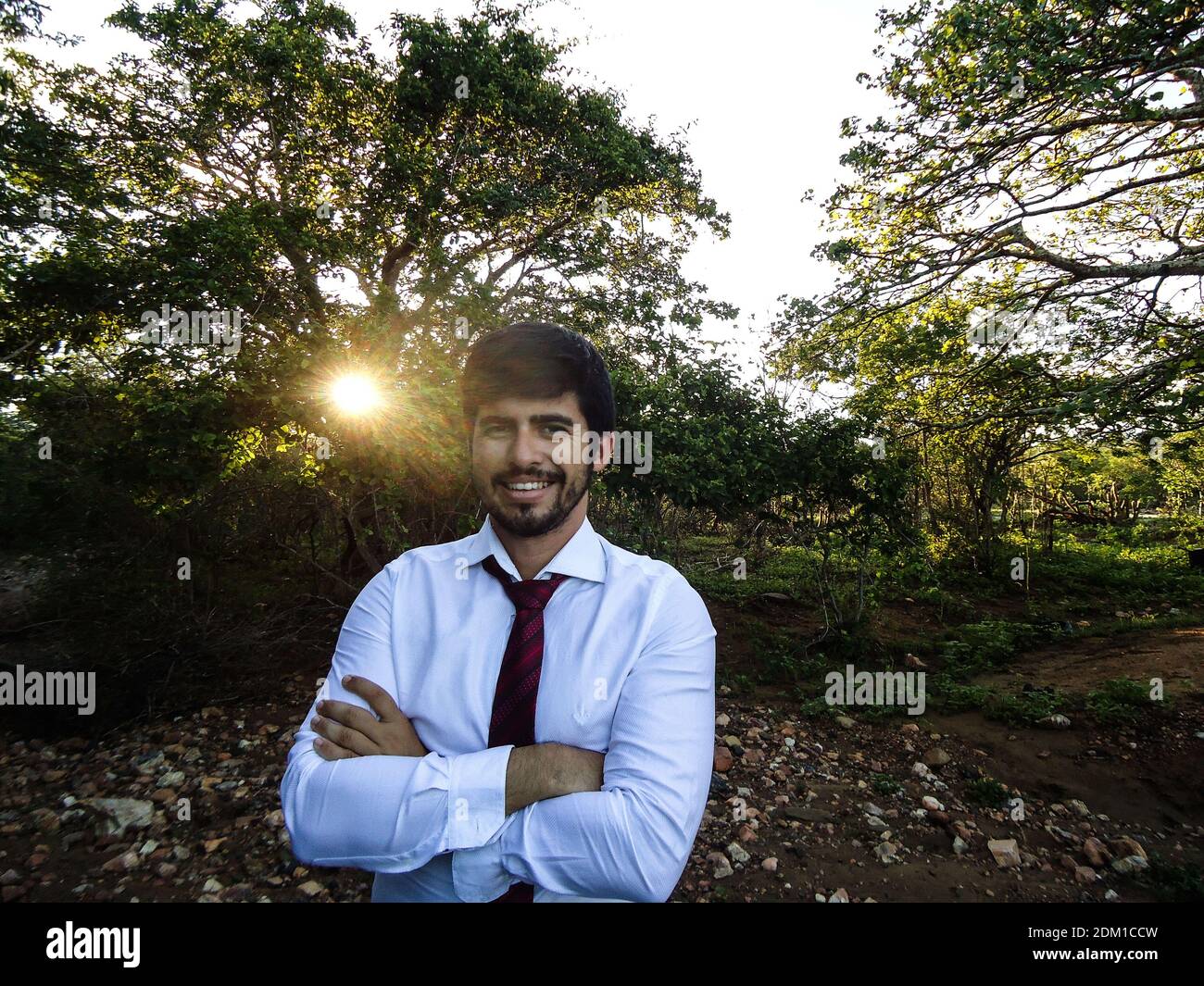 South indian man standing arms hi-res stock photography and images - Alamy