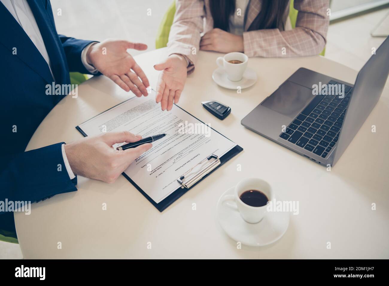 Cropped view portrait of his he her she two people marketing top ceo boss chief meeting discussing buying pre-owned car vehicle trade-in center Stock Photo