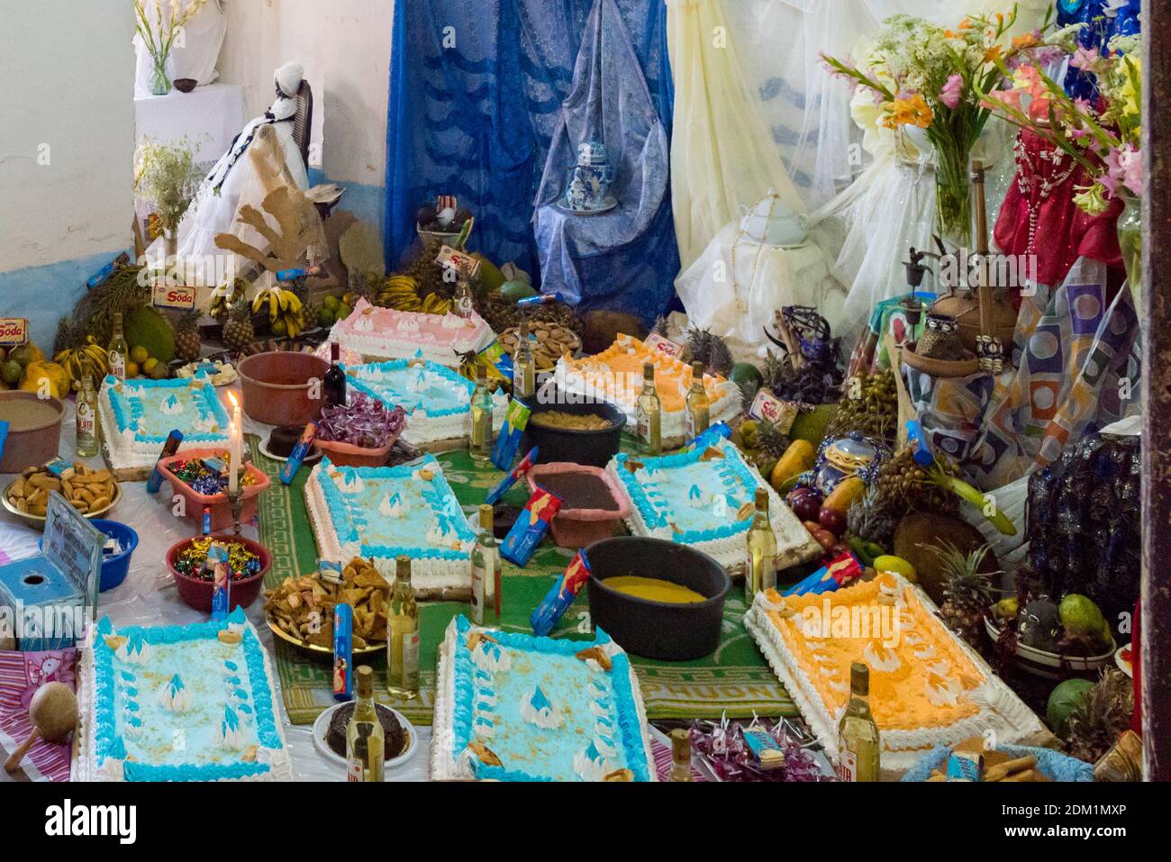 Food offerings in the altar of the Casa Templo de Santeria Yemala, a Santeria temple is Trinidad Cuba Stock Photo
