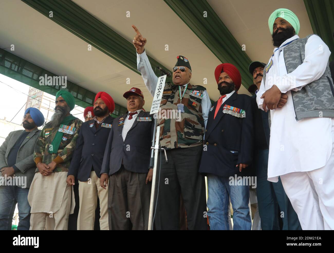 Indian ex-servicemen seen at Singhu border (National Highway 1, linked National Capital New Delhi to Punjab) during the demonstration. Thousands of Farmers protest for 21days on different borders linked to New Delhi demanding the rollback of 3 government agricultural reforms bill. Stock Photo