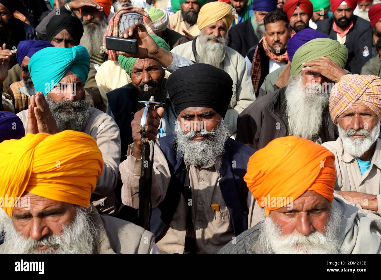 A crowd of protesters gathering at Singhu border (National Highway 1, linked National Capital New Delhi to Punjab) during the demonstration.Thousands of Farmers protest for 21days on different borders linked to New Delhi demanding the rollback of 3 government agricultural reforms bill. Stock Photo