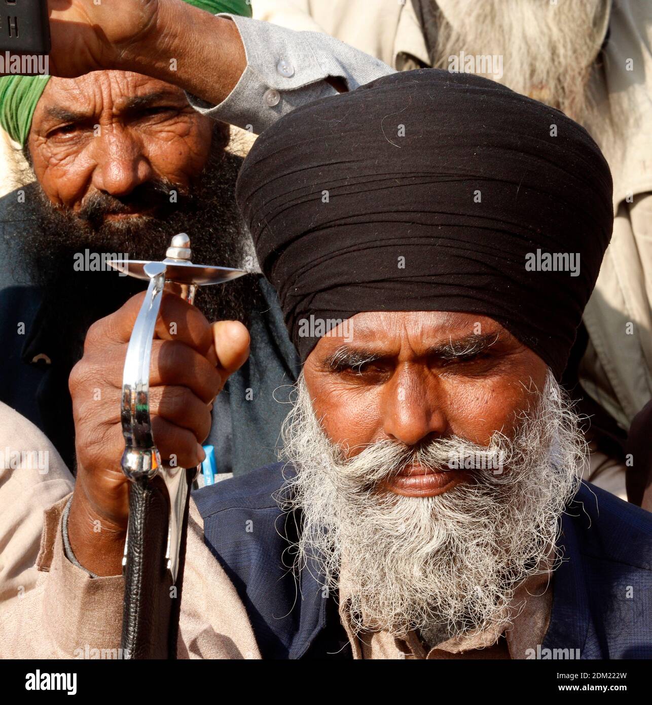 Elderly men seen at Singhu border (National Highway 1, linked National Capital New Delhi to Punjab)during the demonstration. Thousands of Farmers protest for 21days on different borders linked to New Delhi demanding the rollback of 3 government agricultural reforms bill. Stock Photo