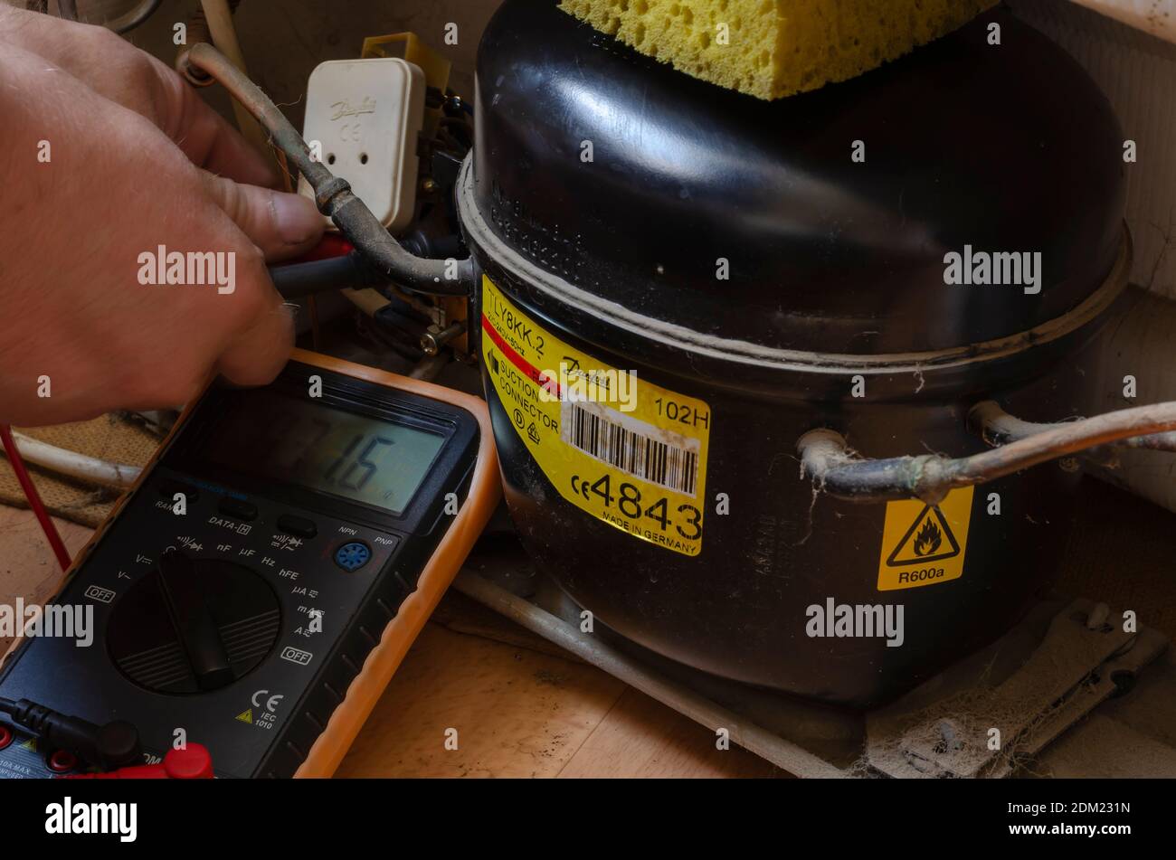 Nikolaev, Ukraine June 30, 2020 an electrician with a multimeter