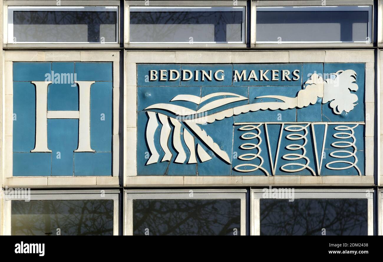 London, England, UK. The Heal's Building / Heal and Son (1917) furniture shop at 196 Tottenham Court Road. Facade detail: bedding makers Stock Photo