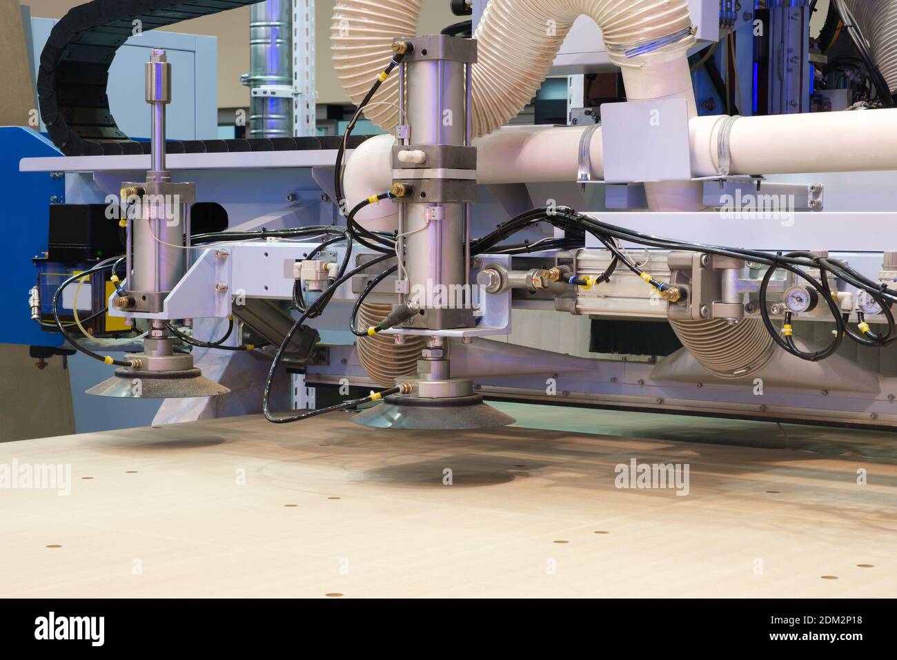 Machine tools format cutting are cut chipboard furniture in the shop. Industry Stock Photo