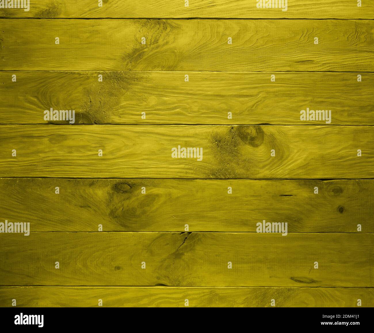 Natural pine wood planks toned in illuminating yellow, color of 2021 year. Background with horizontal layout. View from directly above. Full frame wit Stock Photo