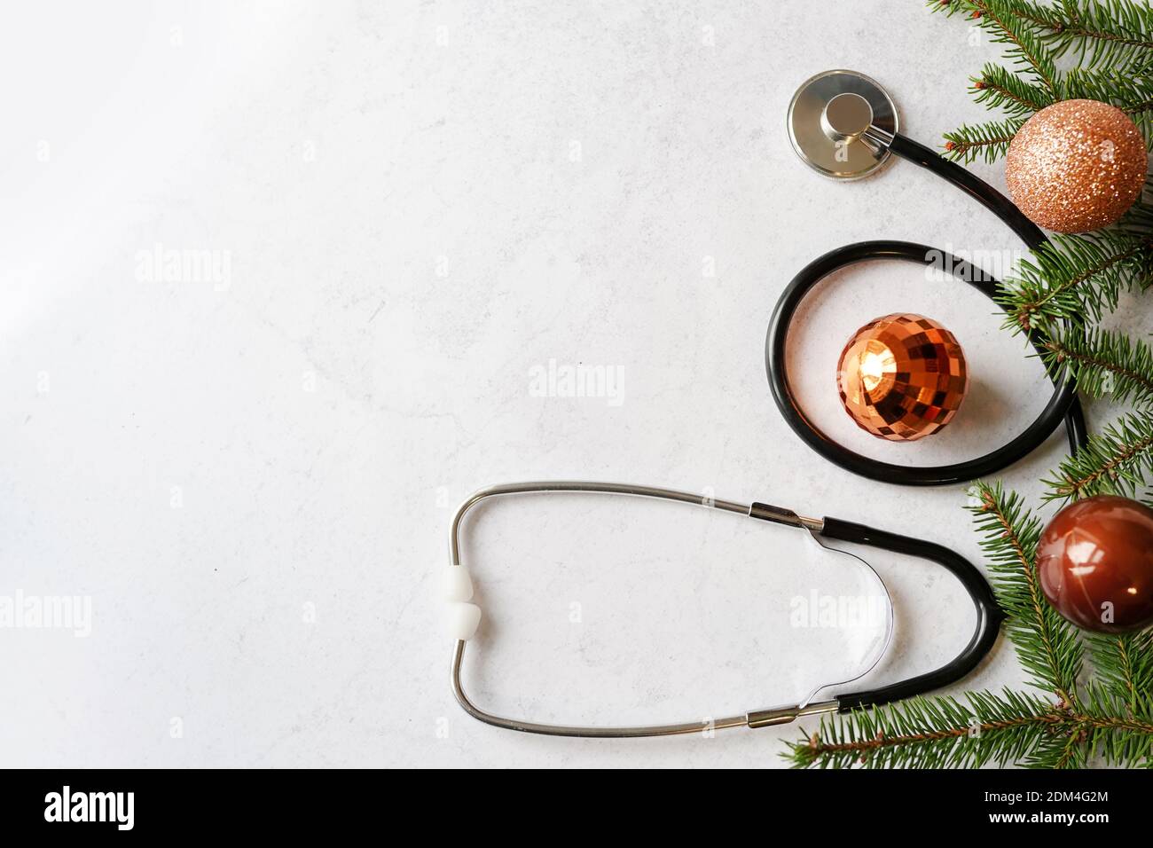Stethoscope and Christmas decorations. Medical concept. Greeting card