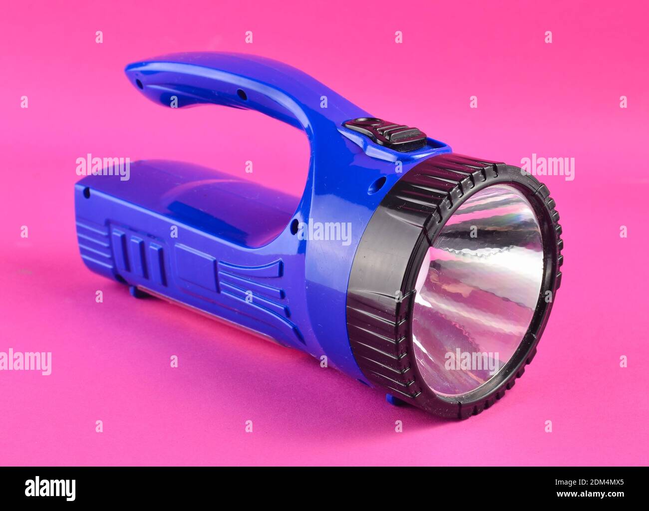 Flashlight Blue Color Blue flashlight isolated on a pink background Stock Photo - Alamy